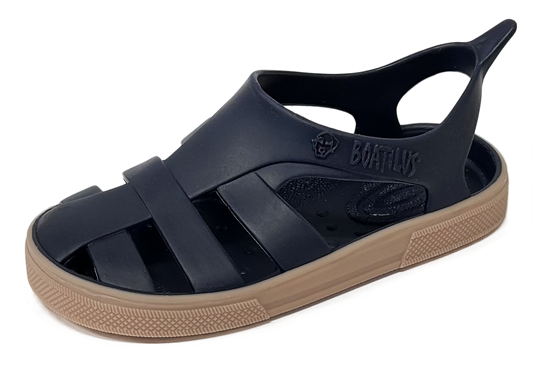 Navy sandal with brown sole on a white background